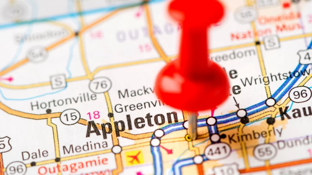 Close-up of a map with a red pushpin on Appleton.