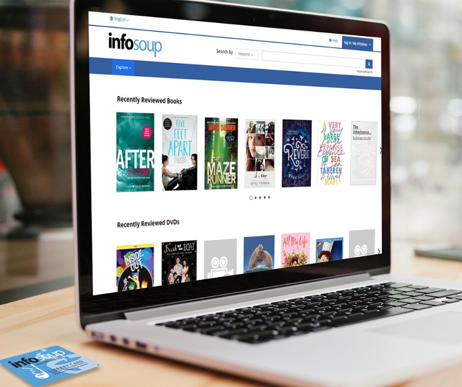 A laptop showing the "infosoup" website with recently reviewed books and DVDs.